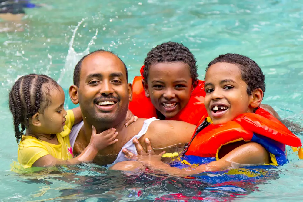 A family in swimming pool in Germany.